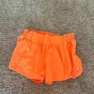 Orange Lululemon shorts 2.5